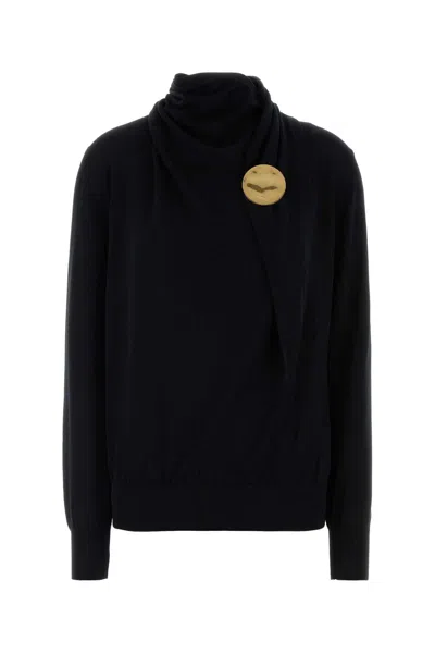 Jil Sander Virgin Wool Turtleneck With Metal Plaque In Black