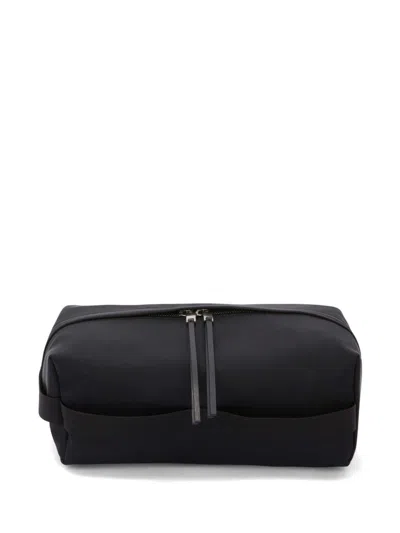 Jil Sander Canvas-clutch In Schwarz