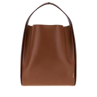 Jil Sander Caramel Leather Pivot Bucket Bag Grape Borse A Secchiello In Brown