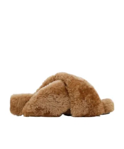 Jil Sander Crossover-strap Shearling Mules In Brown