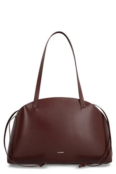 Jil Sander Curve Leather Shoulder Bag In Brown