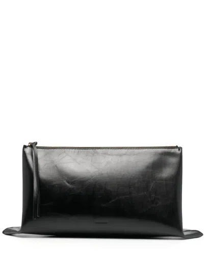 Jil Sander Debossed-logo Leather Clutch In Schwarz