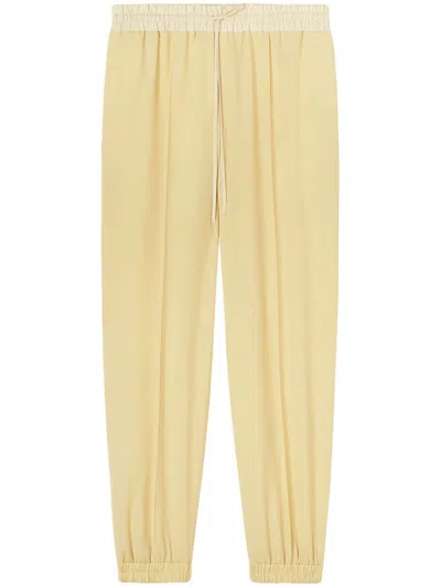 Jil Sander Drawstring-fastening Waist Trousers In Yellow