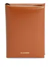 Jil Sander Embossed Logo Folded Passport Holder In Brown