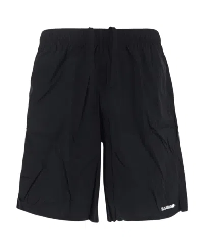 Jil Sander Embroidered-logo Swim Shorts In Black