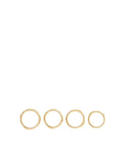 Jil Sander Engraved Logo Irregular-surface Rings (set Of Four) In Gold