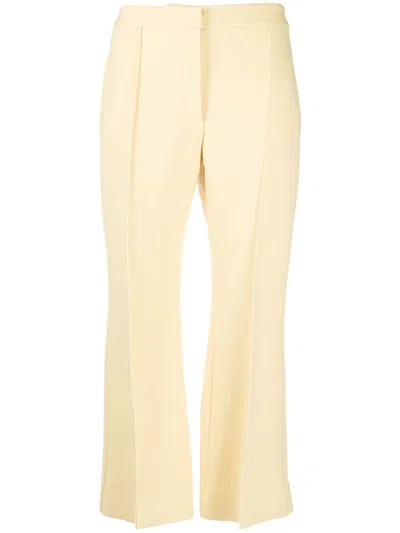 Jil Sander Flared Virgin-wool Cropped Trousers In Gelb