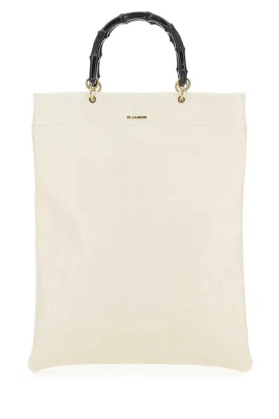 Jil Sander Handbags. In White
