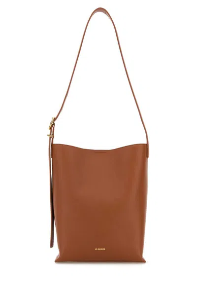 Jil Sander Handbags. In Brown