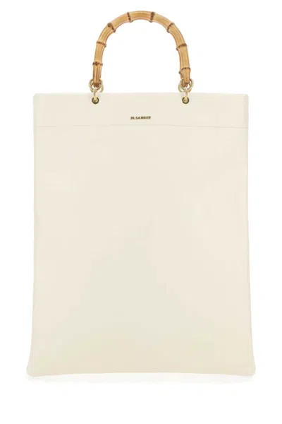 Jil Sander Handbags. In White