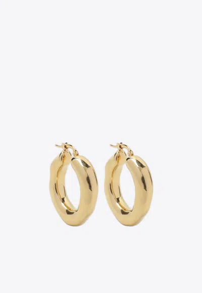 Jil Sander Irregular Brass Hoop Earrings In Gold