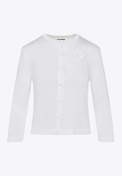 JIL SANDER KNITTED CARDIGAN WITH CROCHET FLOWER