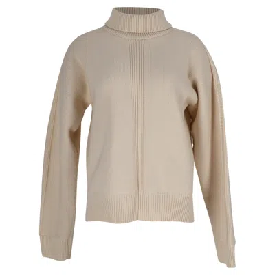 Jil Sander Knitted Mock-neck Open Back Sweater In Cream Wool In Neutral