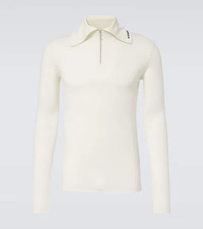 Jil Sander Knitted Turtleneck Top In Beige