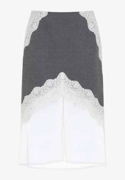 JIL SANDER LACE-INSERTED MIDI SKIRT IN WOOL