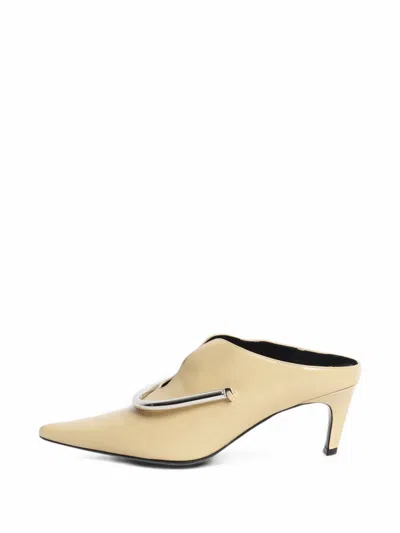 Pre-owned Jil Sander Leather Metal-detail Mules In Yellow