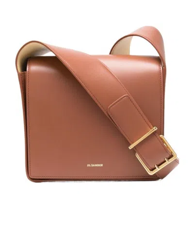 JIL SANDER JIL SANDER LOGO-DETAILED FOLDOVER TOP CROSSBODY BAG