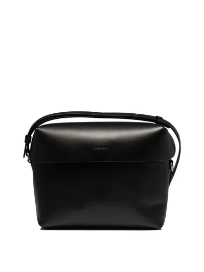 Jil Sander Logo-embossed Crossbody Bag In Black