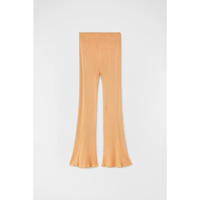 Jil Sander Light Orange Ribbed Flare Trousers In ["orange"]