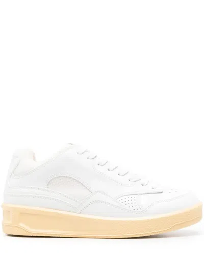 JIL SANDER LOGO-DEBOSSED PANELLED SNEAKERS