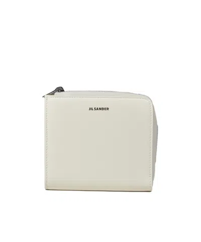 Jil Sander Logo Embossed Zipped Cardholder In White