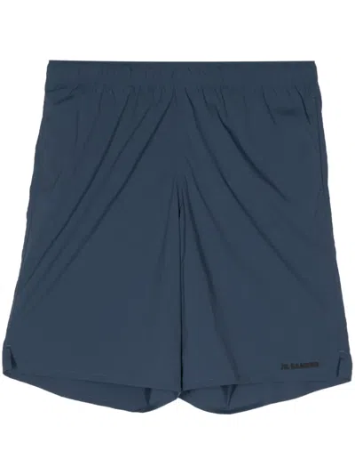 Jil Sander Logo-print Swim Shorts In 蓝色