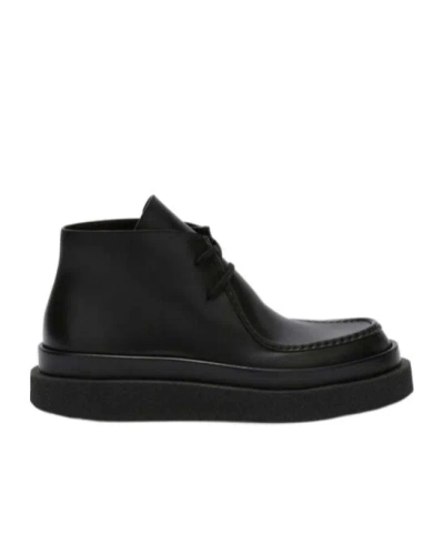 Jil Sander Low Leather Boots In Black