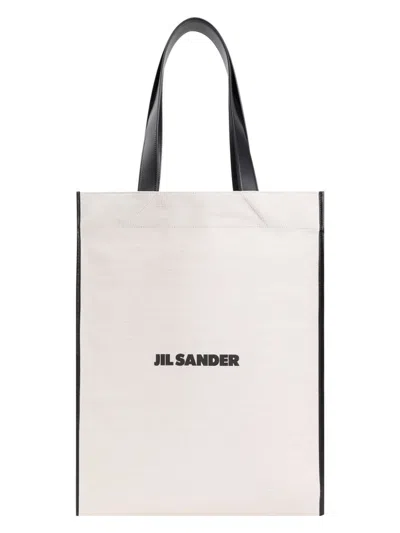 JIL SANDER MEN'S BORDER BOOK TOTE BAG