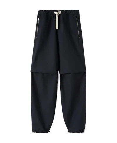 Jil Sander Panelled-design Tapered-leg Trousers In Black
