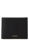 Jil Sander Bi-fold Logo-debossed Wallet In Yellow