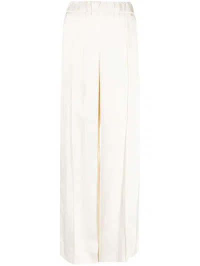 Jil Sander Pressed-crease Elasticated-waist Flared Trousers In Neutrals
