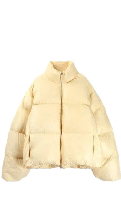 Jil Sander Quilted Down Jacket In Yellow