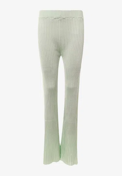 JIL SANDER RIBBED HIGH-WAIST FLARED PANTS
