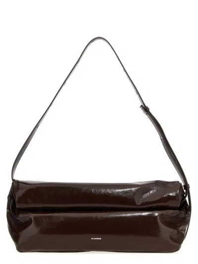 Jil Sander Rollup Crossbody Bags In Brown