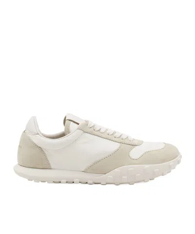 JIL SANDER JIL SANDER LOGO EMBOSSED LOW-TOP SNEAKERS