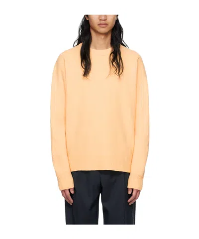 Jil Sander Round Neck Woolen Sweater In Yellow
