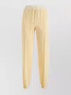 Jil Sander Trousers With Elastic Waistband And Tapered Leg In Yellow