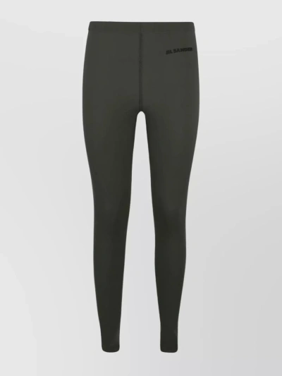 Jil Sander Leggings With Printed Logo In Khaki