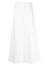 Jil Sander High Waist Flared Cut Jeans In 102