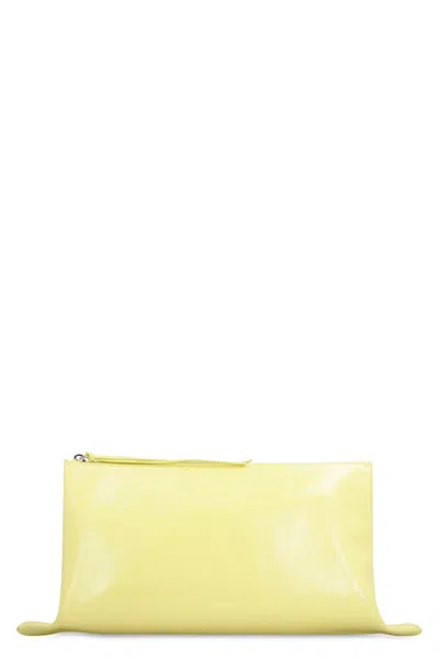 Jil Sander Logo-debossed Clutch Bag In Yellow