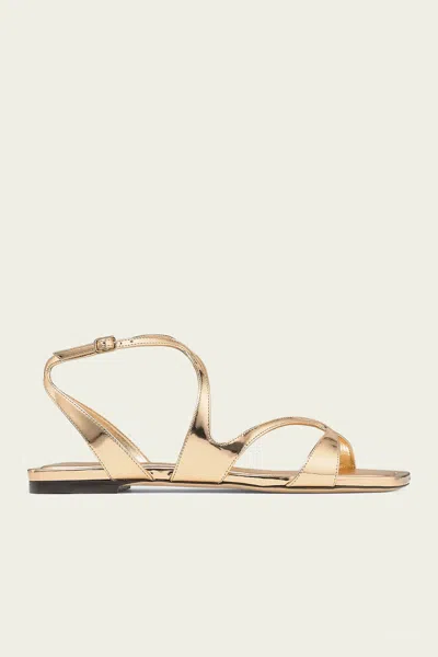 JIMMY CHOO AYLA METALLIC LEATHER FLATS IN GOLD