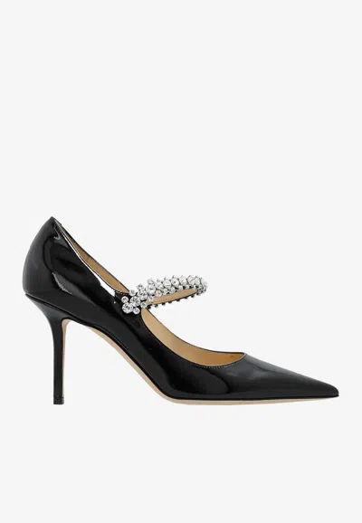 JIMMY CHOO BING 85 CRYSTAL-EMBELLISHED PUMPS IN PATENT LEATHER