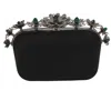 Jimmy Choo Cloud Clutch Satin Bag With Floral Crown In Black In Black