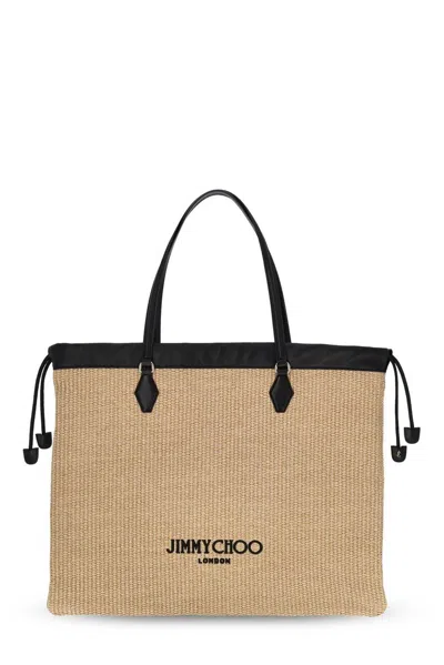 Jimmy Choo Drawstring Logo Embroidered Tote Bag In Nude