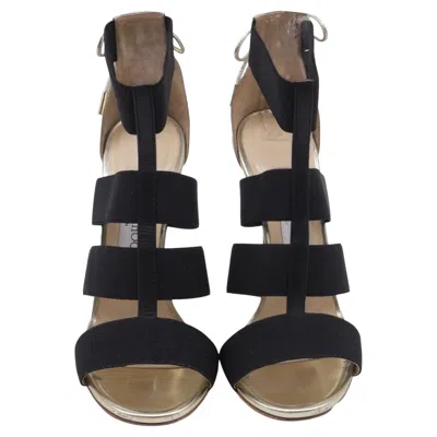 Pre-owned Jimmy Choo Elastic Strap Sandal Heels In Gold Leather In Black