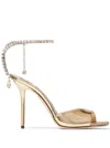 JIMMY CHOO GOLD-TONE SAEDA SANDALS WITH CRYSTAL EMBELLISHMENT IN CALF LEATHER WOMAN