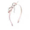 Jimmy Choo Crystal-bow Headband In Pink