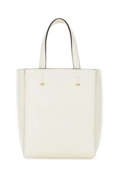 Jimmy Choo Handbags. In Gold