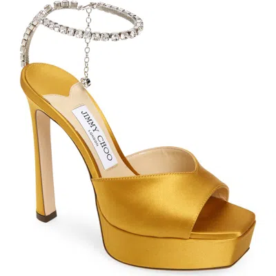 Jimmy Choo Saeda Crystal Ankle Strap Peep Toe Sandal In Gold