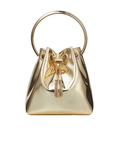 Jimmy Choo Shiny Mirror-effect Bon Bon Bag With Chain Drawstring And Metal Handle In Gold